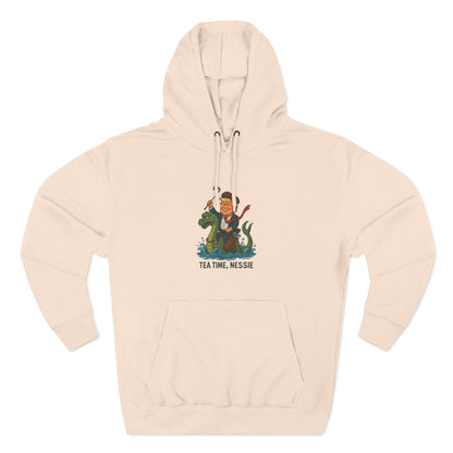 Nessie Tea Time Hoodie, Cozy Sweatshirt for Dragon Lovers, Gift for Tea Enthusiasts, Fun Highland Mythology Apparel, Comfortable Casual Wear Printify