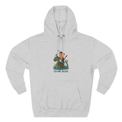 Nessie Tea Time Hoodie, Cozy Sweatshirt for Dragon Lovers, Gift for Tea Enthusiasts, Fun Highland Mythology Apparel, Comfortable Casual Wear Printify