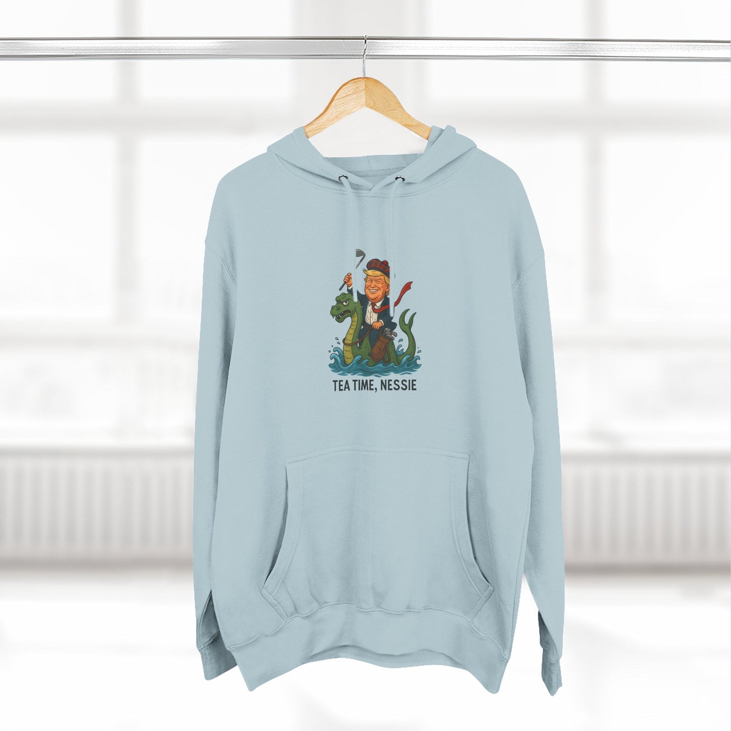 Nessie Tea Time Hoodie, Cozy Sweatshirt for Dragon Lovers, Gift for Tea Enthusiasts, Fun Highland Mythology Apparel, Comfortable Casual Wear Printify