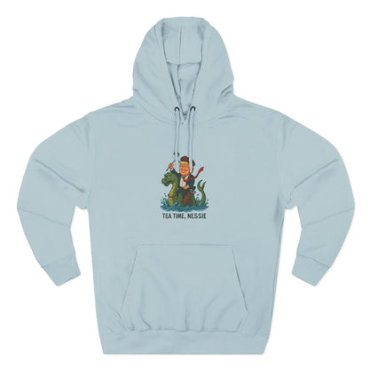 Nessie Tea Time Hoodie, Cozy Sweatshirt for Dragon Lovers, Gift for Tea Enthusiasts, Fun Highland Mythology Apparel, Comfortable Casual Wear Printify