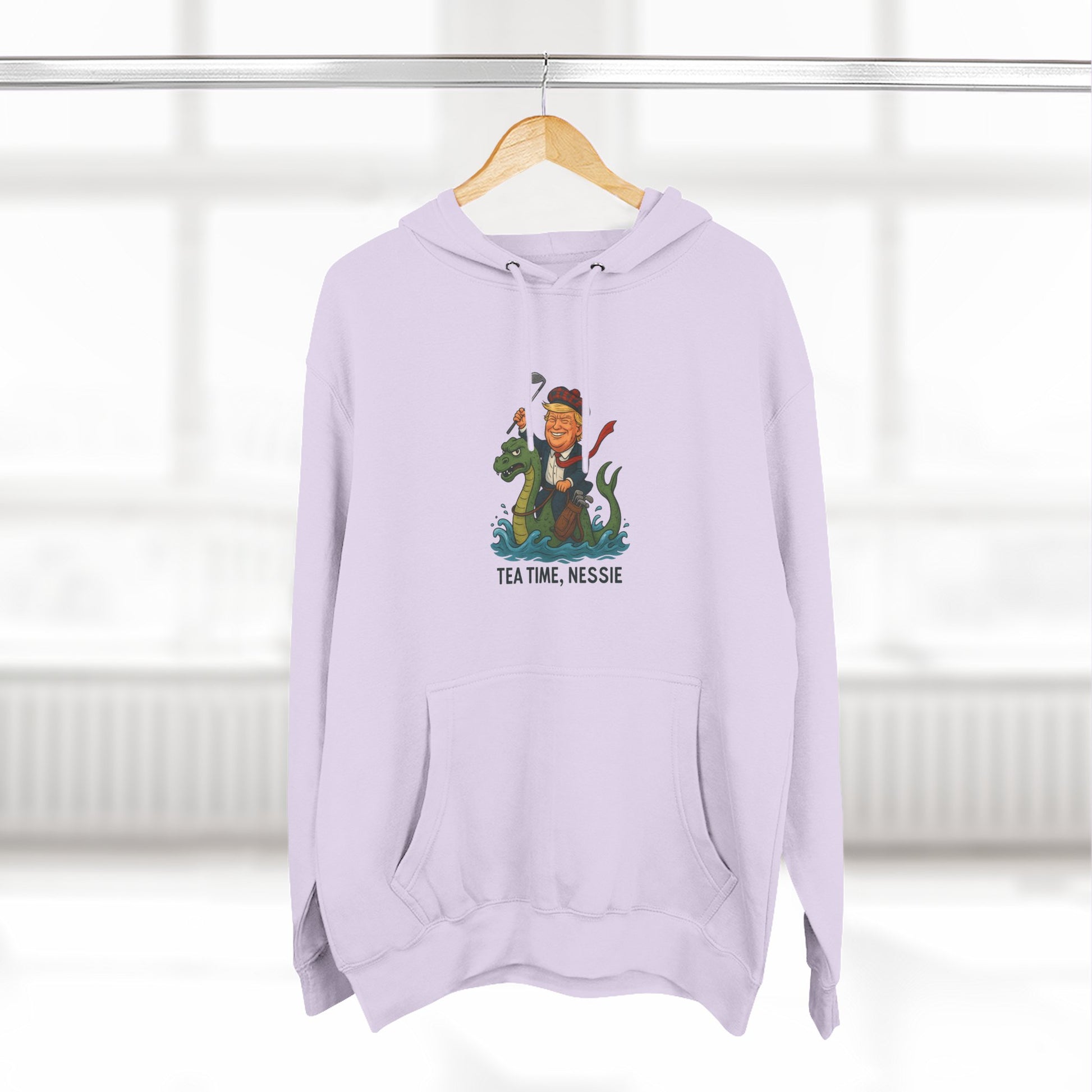 Nessie Tea Time Hoodie, Cozy Sweatshirt for Dragon Lovers, Gift for Tea Enthusiasts, Fun Highland Mythology Apparel, Comfortable Casual Wear Printify