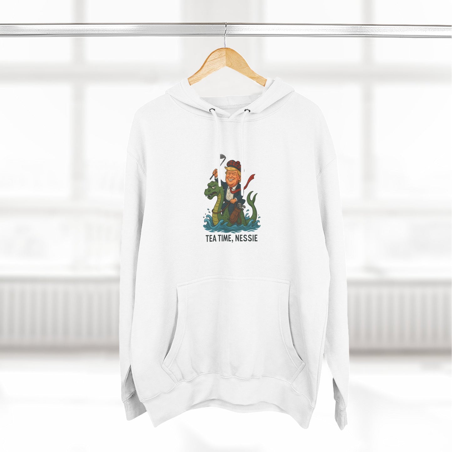 Nessie Tea Time Hoodie, Cozy Sweatshirt for Dragon Lovers, Gift for Tea Enthusiasts, Fun Highland Mythology Apparel, Comfortable Casual Wear Printify