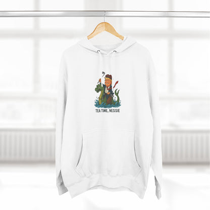 Nessie Tea Time Hoodie, Cozy Sweatshirt for Dragon Lovers, Gift for Tea Enthusiasts, Fun Highland Mythology Apparel, Comfortable Casual Wear Printify