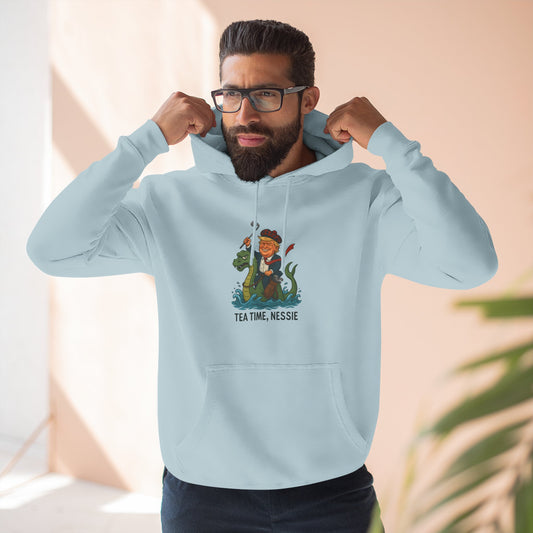 Nessie Tea Time Hoodie, Cozy Sweatshirt for Dragon Lovers, Gift for Tea Enthusiasts, Fun Highland Mythology Apparel, Comfortable Casual Wear Printify