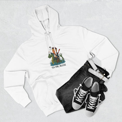 Nessie Tea Time Hoodie, Cozy Sweatshirt for Dragon Lovers, Gift for Tea Enthusiasts, Fun Highland Mythology Apparel, Comfortable Casual Wear Printify